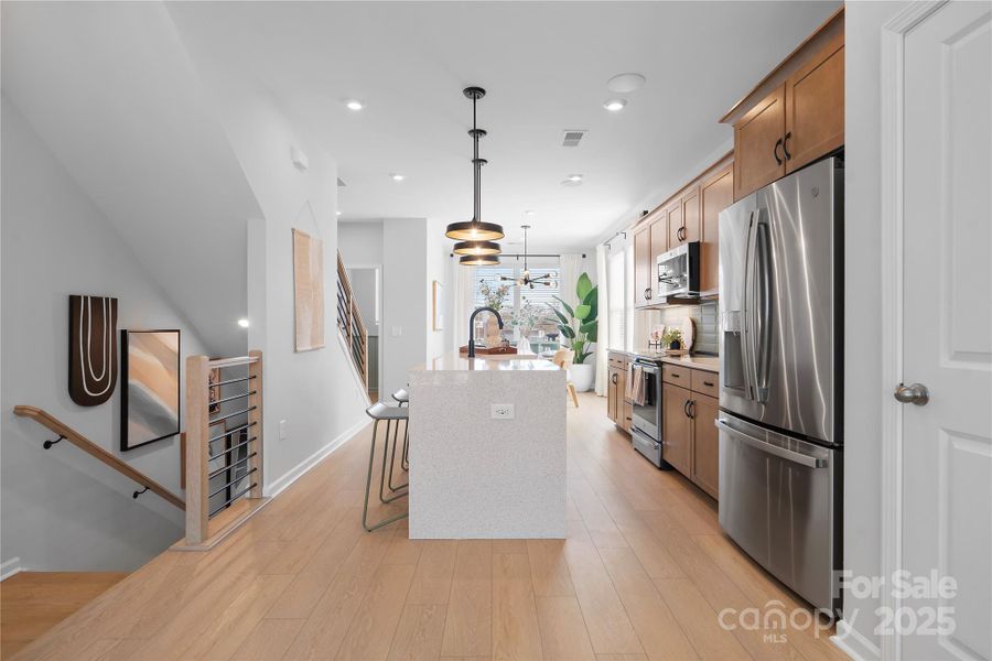 The Heart of the Home Accented by Handpicked Selections and Open Rail.