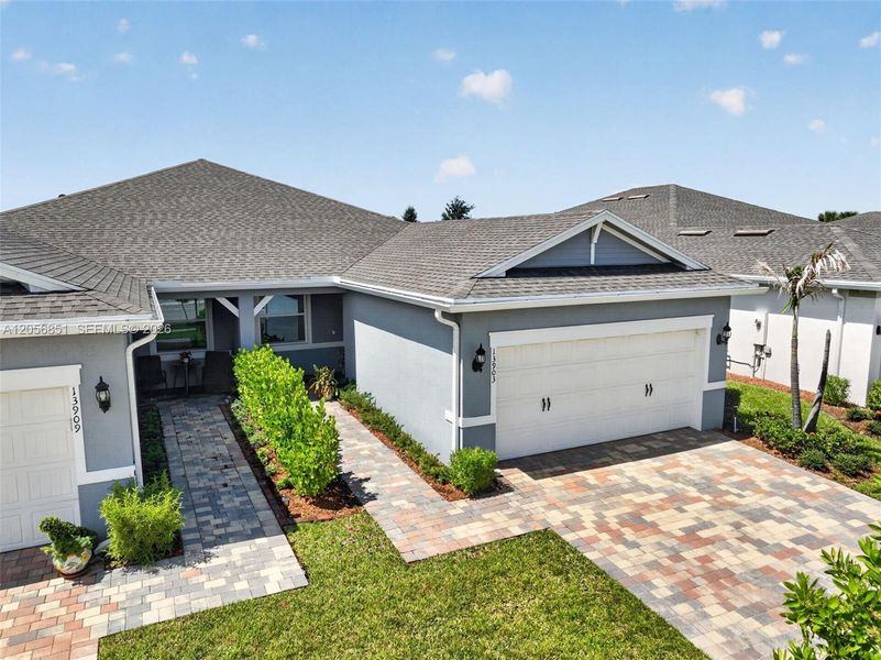 Front exterior of a new home in , Port St. Lucie, FL, highlighting curb appeal (Image 29).