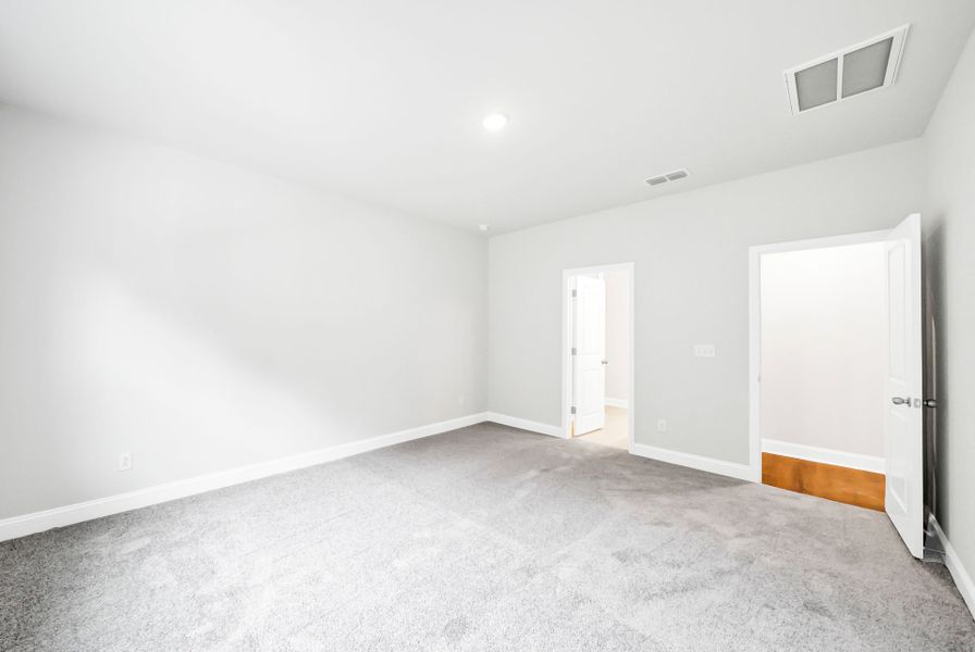 Spacious, unfurnished interior of a new home in Monroe Preserve, Chapin (Image 35).