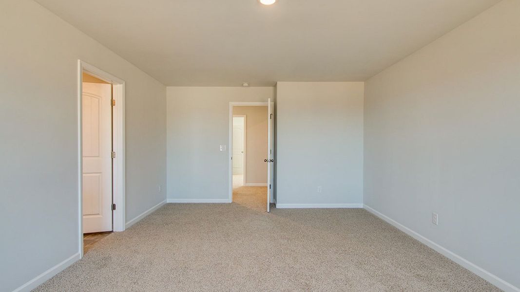 Spacious, unfurnished interior of a new home in The Parks, White House (Image 26).