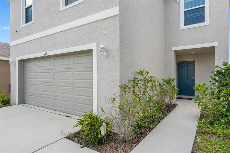 Front exterior of a new home in , Ruskin, FL, highlighting curb appeal (Image 21). Front exterior of a new home in , Ruskin, FL, highlighting curb appeal (Image 21).