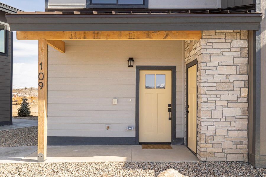 Front exterior of a new home in , Granby, CO, highlighting curb appeal (Image 21). Front exterior of a new home in , Granby, CO, highlighting curb appeal (Image 21).