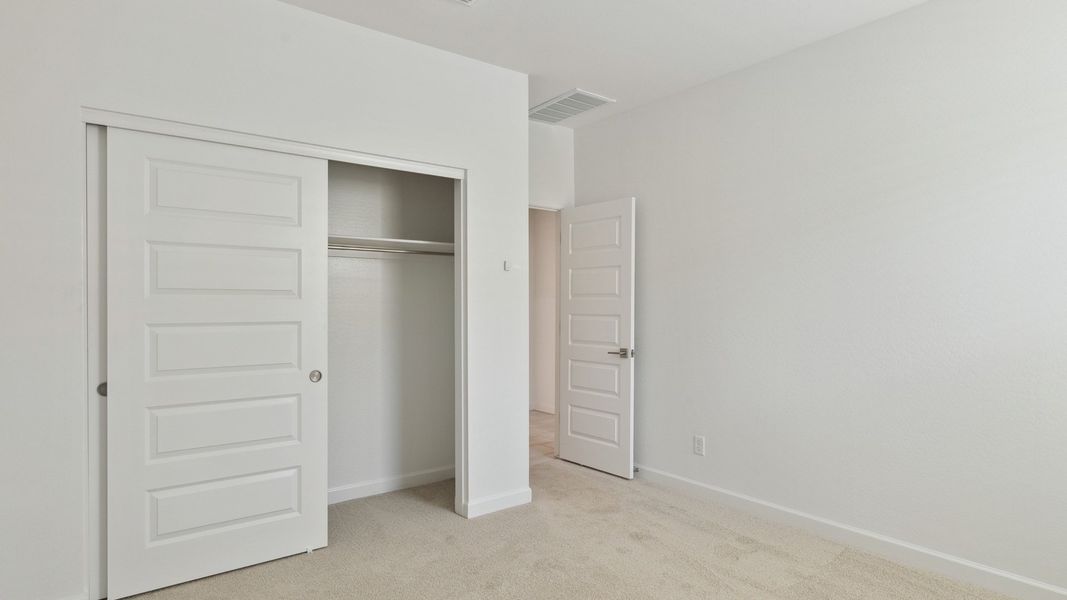 Representative unfurnished interior of a home built from the Cobalt by D.R. Horton in Zanjero Pass, Glendale (Image 18).
