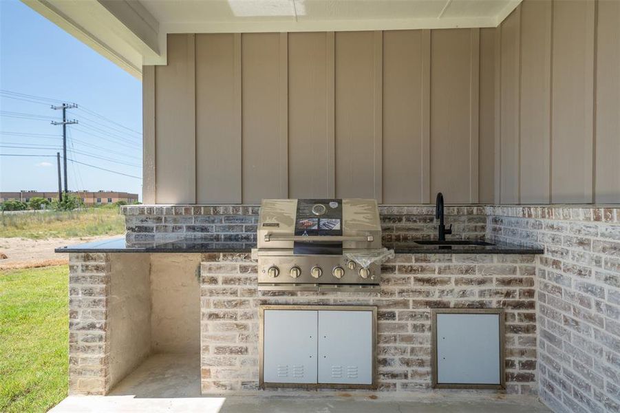View of patio / terrace with a grill and a sink View of patio / terrace with a grill and a sink
