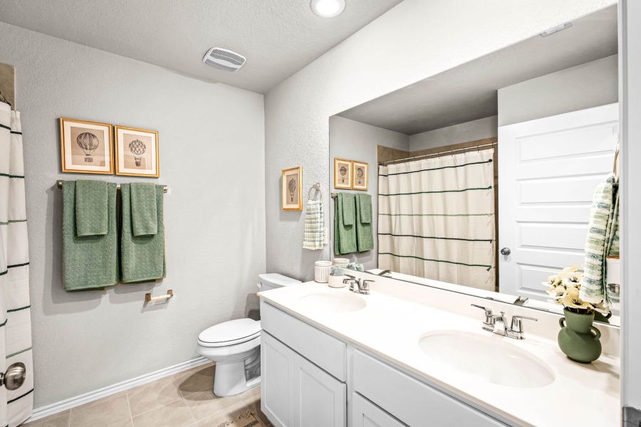 These are images of the secondary bathrooms in the Hawkins plan and is the model home in Carillon at 13305 Eppright Trace Blvd., Manor, TX. These are images of the secondary bathrooms in the Hawkins plan and is the model home in Carillon at 13305 Eppright Trace Blvd., Manor, TX.