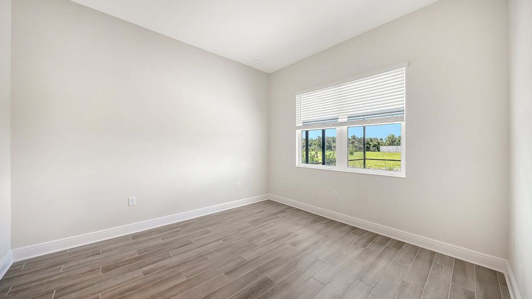 Spacious, unfurnished interior of a new home in Canoe Creek Real Estate and Homes for Sale in Parrish, FL - Neal Communities, Parrish (Image 65).