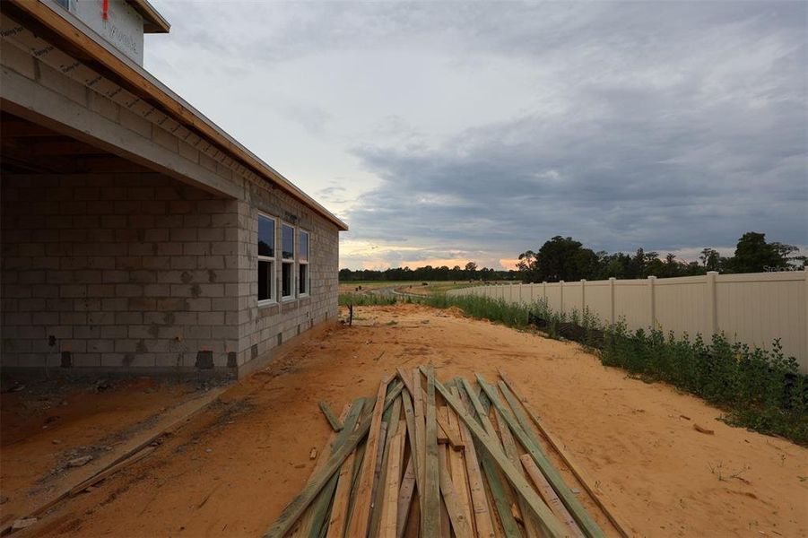 In-progress construction of a new home in Lake Star at Ovation, Winter Garden, FL (Image 9).
