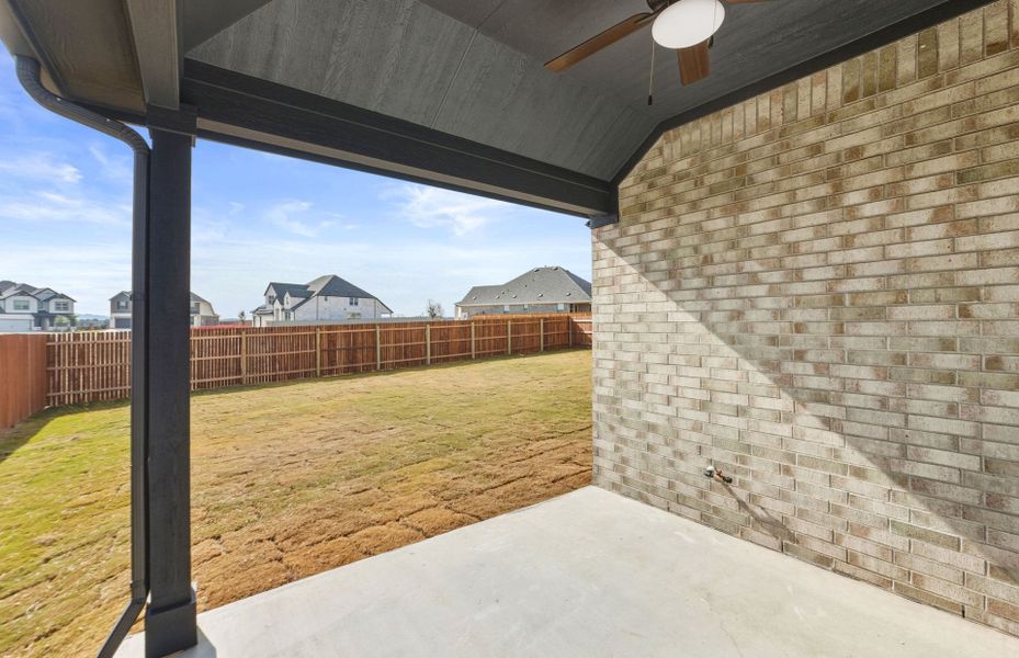 Exterior details and patio area of a home in Saddleback at Santa Rita Ranch, Liberty Hill (Image 23).