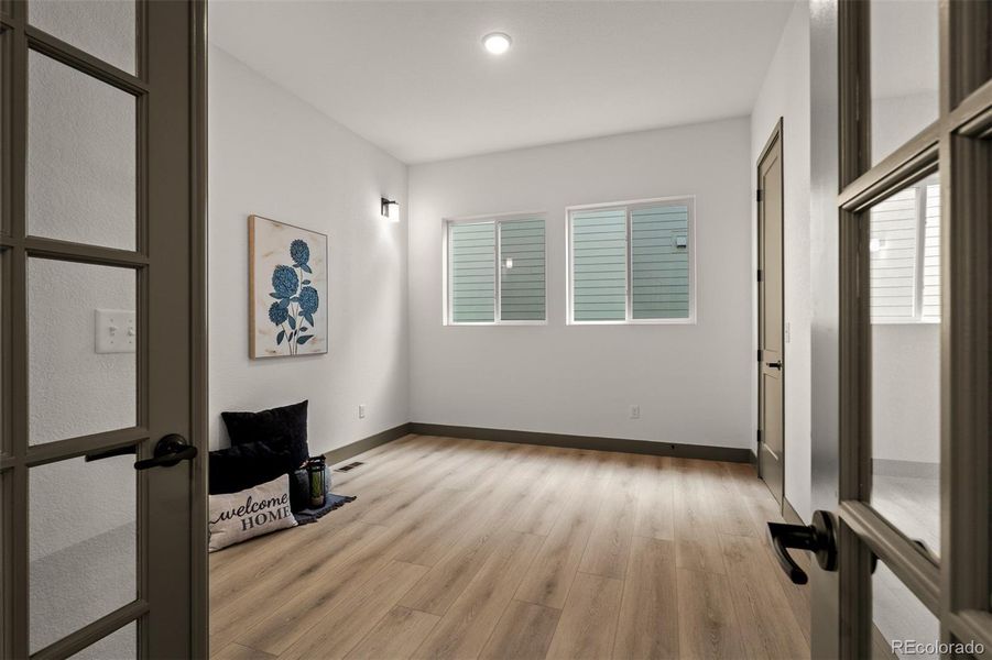 Spacious, unfurnished interior of a new home in Revel Crossing at Wolf Ranch - The Panorama Collection, Colorado Springs (Image 35).