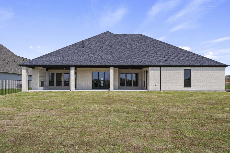 Exterior details and patio area of a home in Winding Creek, Rockwall (Image 27).