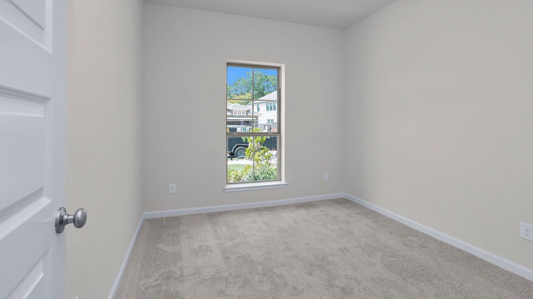 Spacious, unfurnished interior of a new home in The Groves 45', Humble (Image 11).