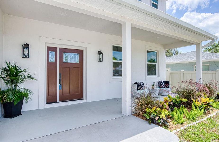 Front exterior of a new home in , Palm Harbor, FL, highlighting curb appeal (Image 23).
