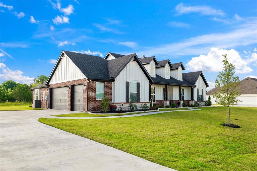 Front exterior of a new home in , Waxahachie, TX, highlighting curb appeal (Image 27). Front exterior of a new home in , Waxahachie, TX, highlighting curb appeal (Image 27).