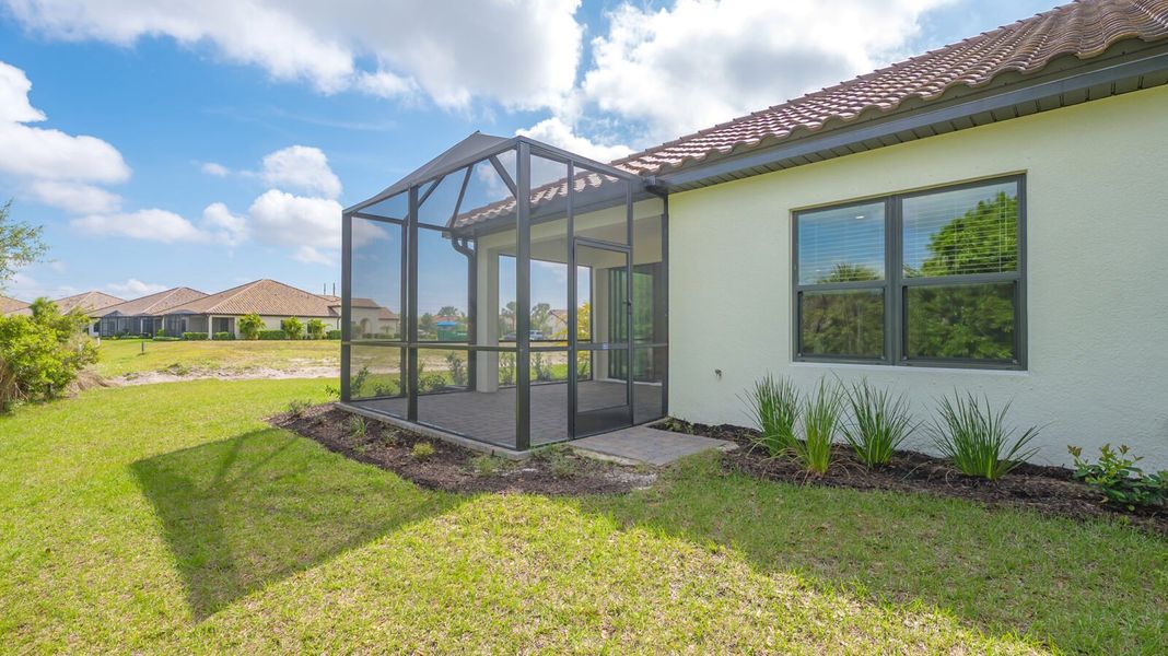 Exterior details and patio area of a home in Boca Royale Golf and Country Club at Wellen Park, Englewood (Image 26).