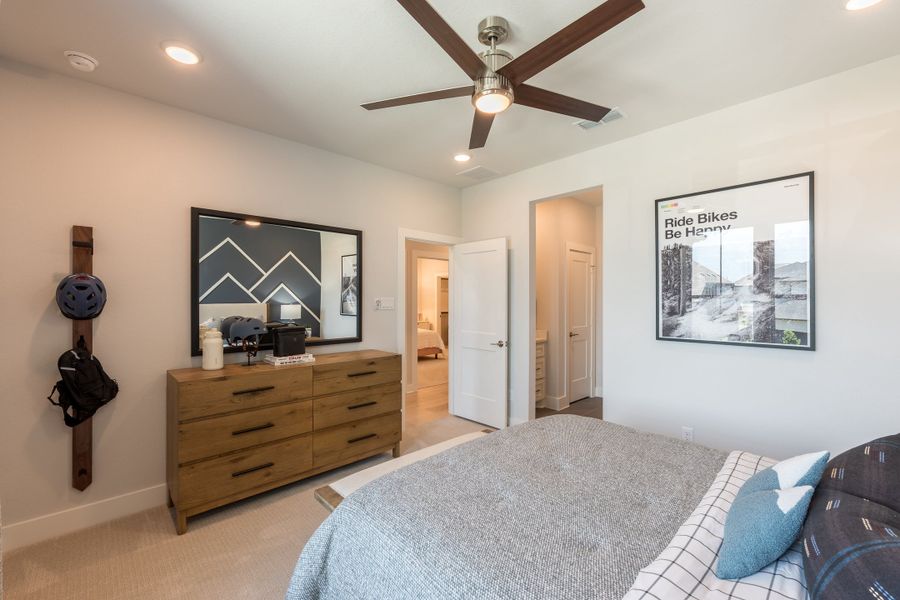 Representative furnished interior of a home built from the Woodbridge by Tri Pointe Homes in Bridgeland, Cypress (Image 37).