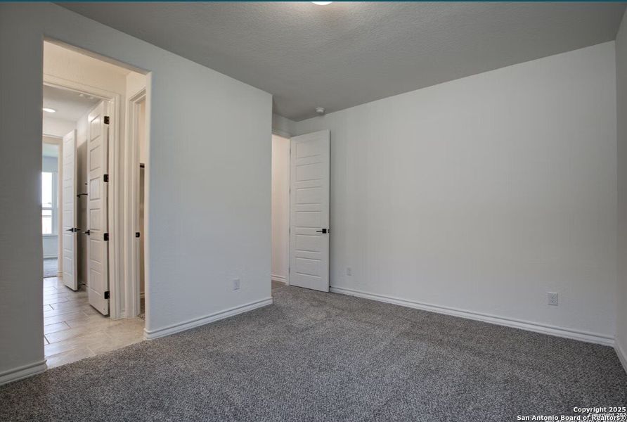 Spacious, unfurnished interior of a new home in The Reserve at Potranco Oaks, Castroville (Image 17).