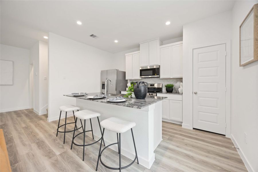 Furnished interior view inside a new home in Grand West, Houston (Image 6).