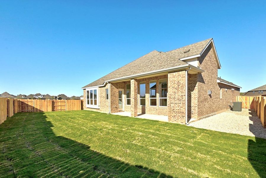 Exterior details and patio area of a home in 6 Creeks at Waterridge, Kyle (Image 2).