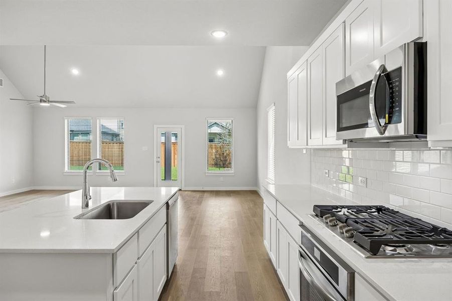 Kitchen in the Winters home plan by Trophy Signature Homes – REPRESENTATIVE PHOTO