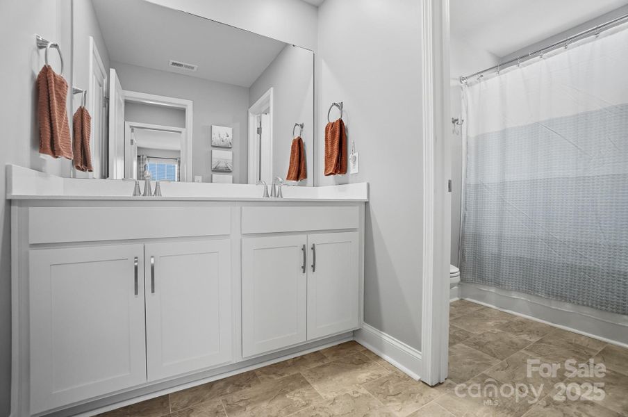 Furnished interior view inside a new home in , Monroe (Image 33).