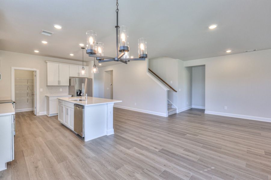 The open-concept floorplan allows for an easy flow between the kitchen and dining areas.