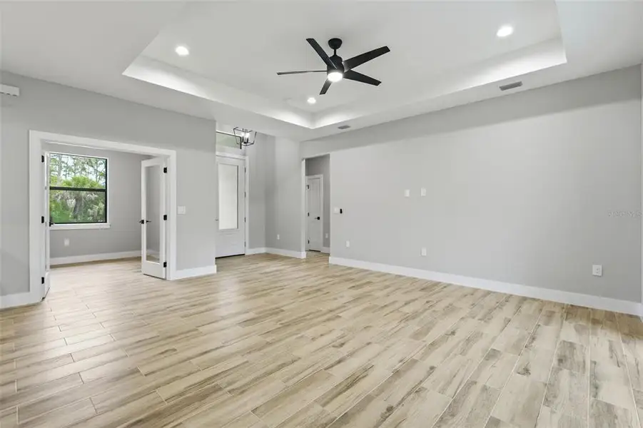Spacious, unfurnished interior of a new home in , Port Charlotte (Image 31).