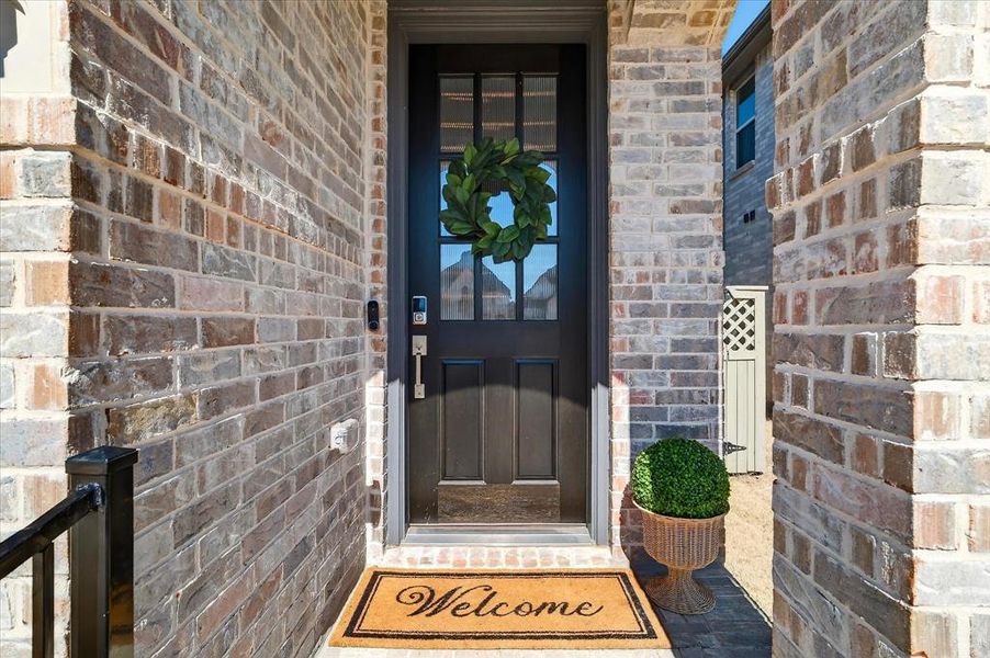 Exterior details and patio area of a home in Pecan Square, Northlake (Image 4).