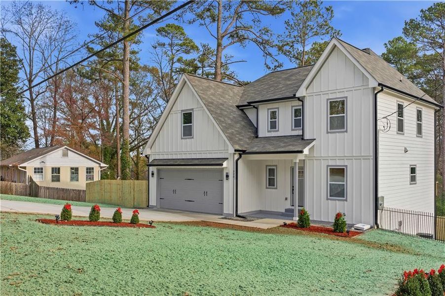 Front exterior of a new home in , Mableton, GA, highlighting curb appeal (Image 23).