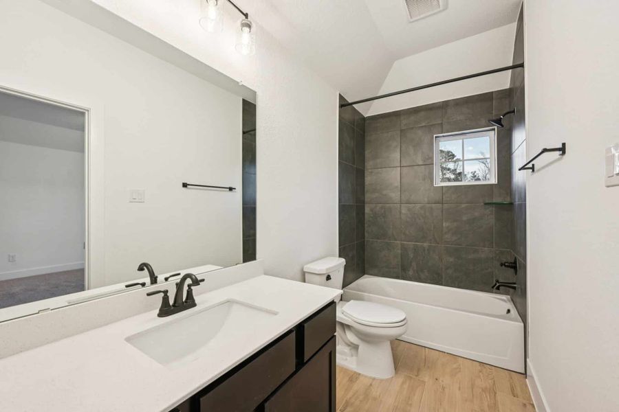 Furnished interior view inside a new home in The Woodlands Hills, Willis (Image 13).