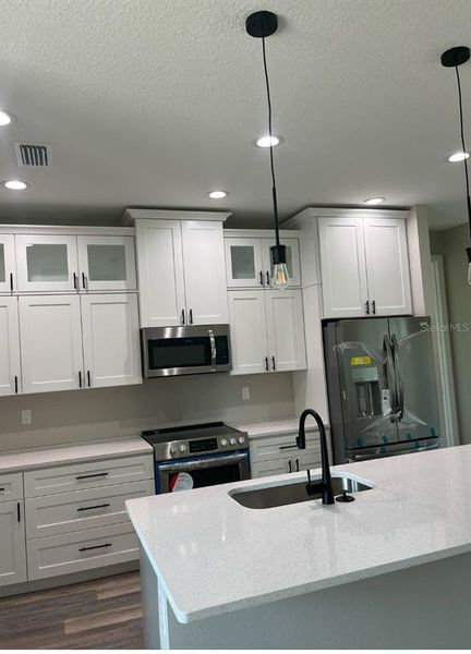 Furnished interior view inside a new home in , Port Charlotte (Image 5).