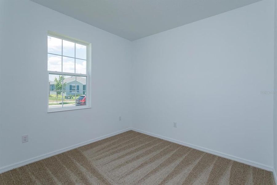 Spacious, unfurnished interior of a new home in Reserve at Hammock Oaks, Lady Lake (Image 27).