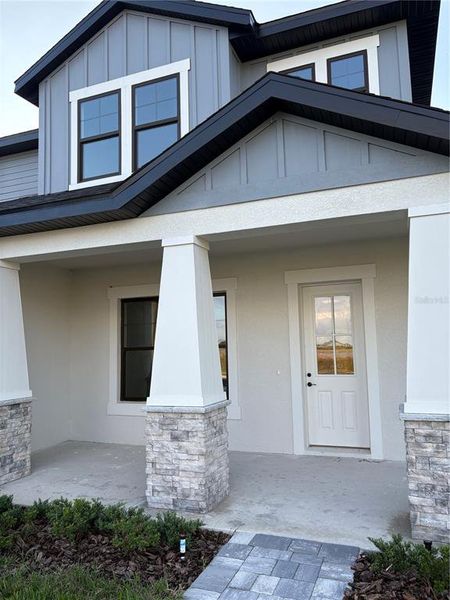Exterior details and patio area of a home in , Auburndale (Image 3).