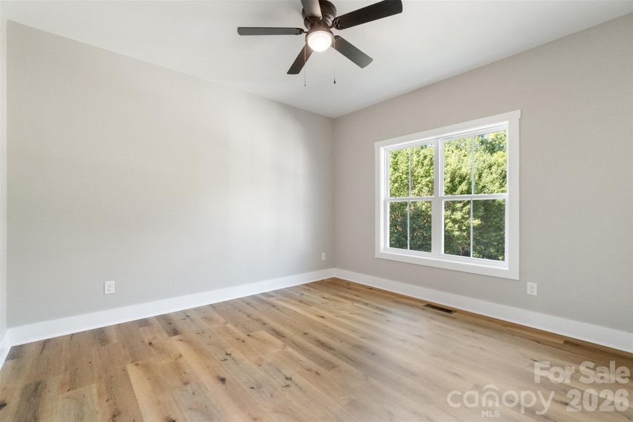 Spacious, unfurnished interior of a new home in , West End (Image 18).