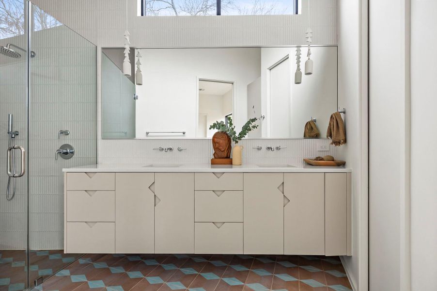 Bathroom featuring double vanity Bathroom featuring double vanity