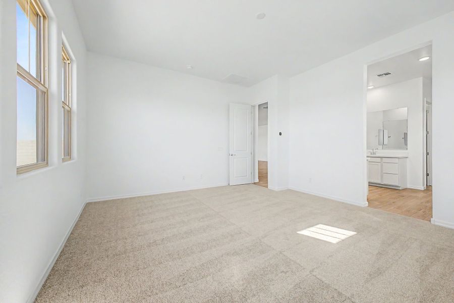 Spacious, unfurnished interior of a new home in Empire Pointe, Queen Creek (Image 14).