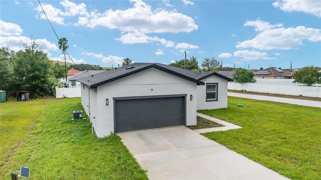 Front exterior of a new home in , Ocala, FL, highlighting curb appeal (Image 1). Front exterior of a new home in , Ocala, FL, highlighting curb appeal (Image 1).