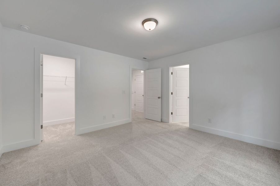 Spacious, unfurnished interior of a new home in Ashmore Townes, Garner (Image 16). Spacious, unfurnished interior of a new home in Ashmore Townes, Garner (Image 16).