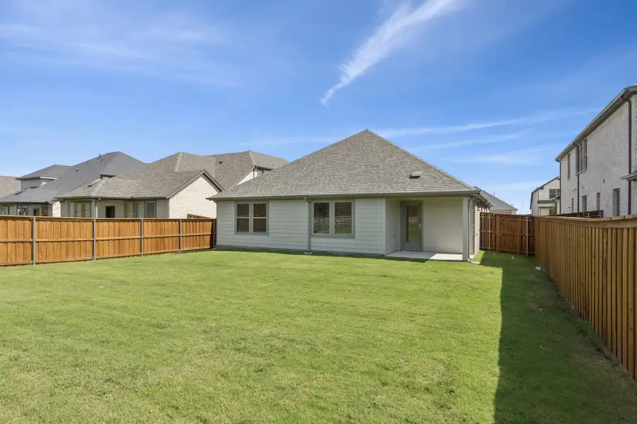 Covered Patio in the Heisman home plan by Trophy Signature Homes – REPRESENTATIVE PHOTO