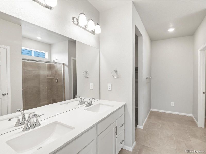 Furnished interior view inside a new home in Buffalo Highlands: The Canyon Collection, Commerce City (Image 13).
