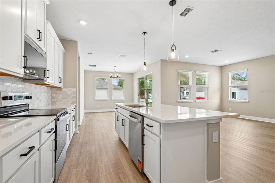 Furnished interior view inside a new home in Legends Preserve - Signature Series, Daytona Beach (Image 13).