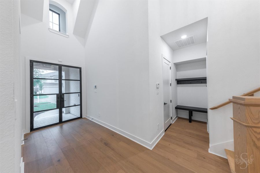 Notice the mudroom area with built-in bench and storage spaces. Notice the mudroom area with built-in bench and storage spaces.