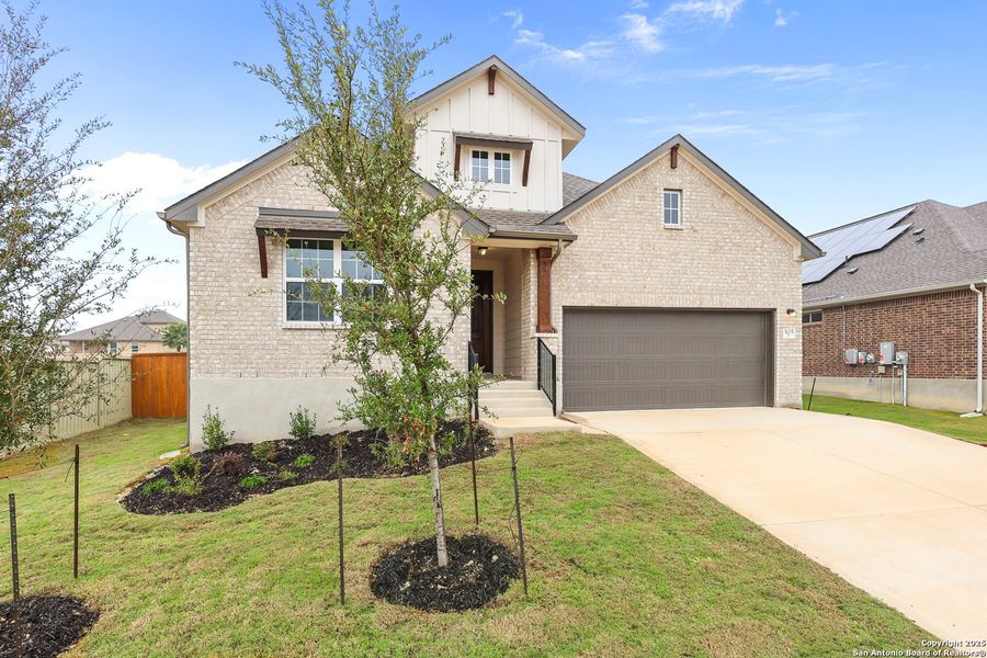 Front exterior of a new home in Foxbrook, Cibolo, TX, highlighting curb appeal (Image 2). Front exterior of a new home in Foxbrook, Cibolo, TX, highlighting curb appeal (Image 2).