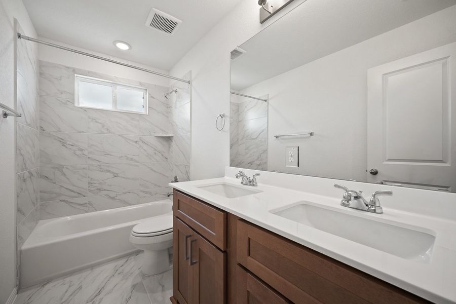 Furnished interior view inside a new home in Porter Country, Buda (Image 14). Furnished interior view inside a new home in Porter Country, Buda (Image 14).