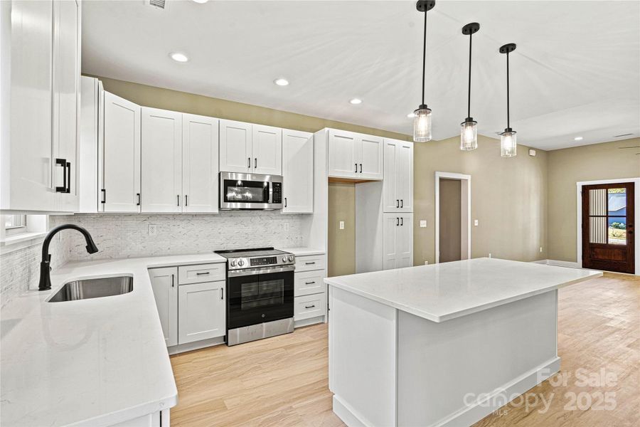Furnished interior view inside a new home in , Newton (Image 3).