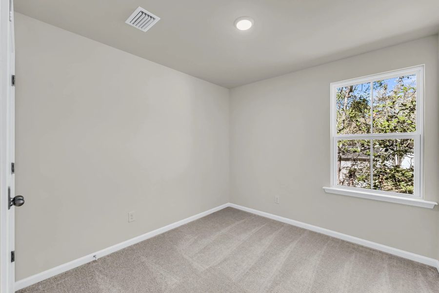 Spacious, unfurnished interior of a new home in Windward Village, Summerville (Image 11).