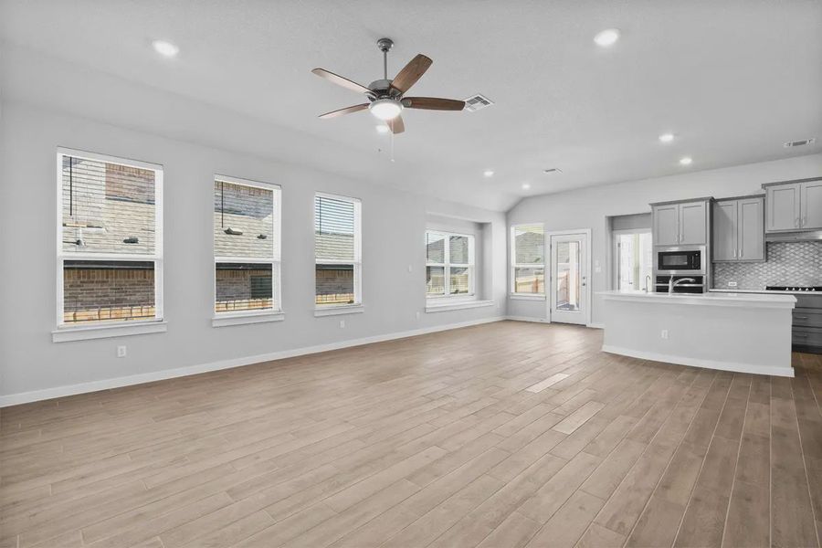 Representative unfurnished interior of a home built from the Cooper by Chesmar Homes in Carillon, Boerne (Image 7).