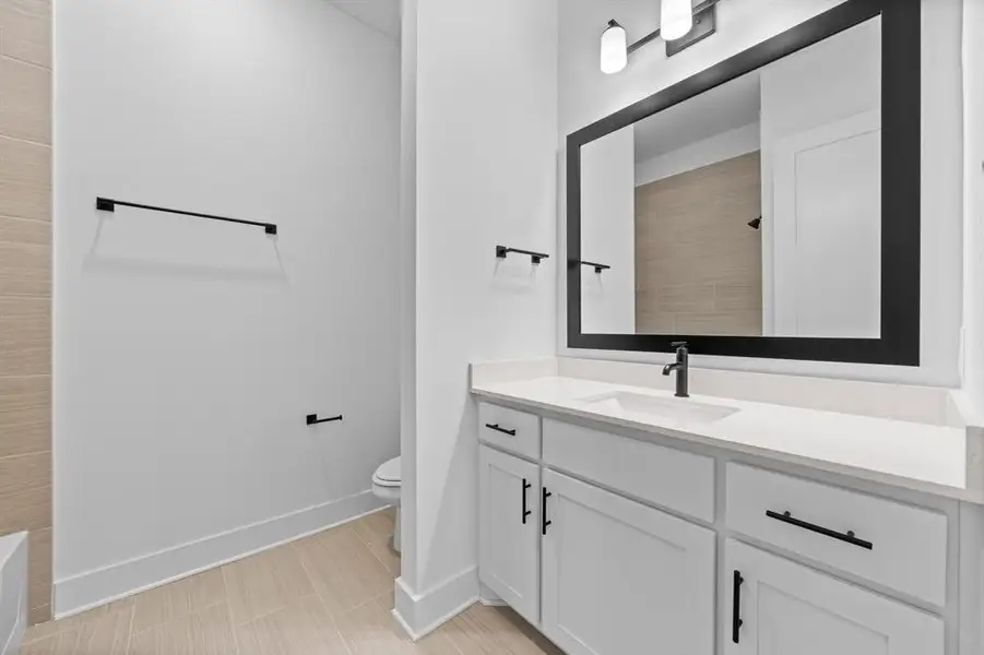 Furnished interior view inside a new home in The Woodlands, Krugerville (Image 8).