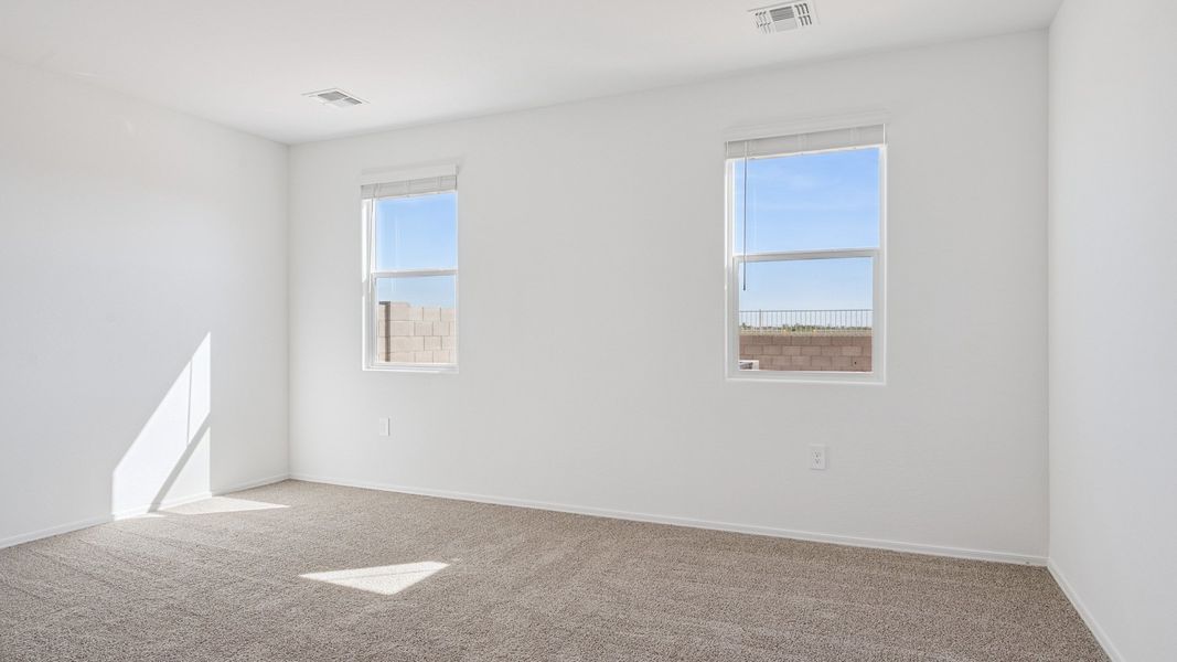 Representative unfurnished interior of a home built from the Ibis by D.R. Horton in Elena Trails, Maricopa (Image 20).