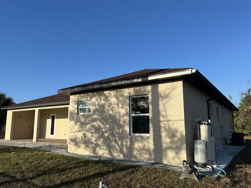 Exterior details and patio area of a home in , North Port (Image 20).