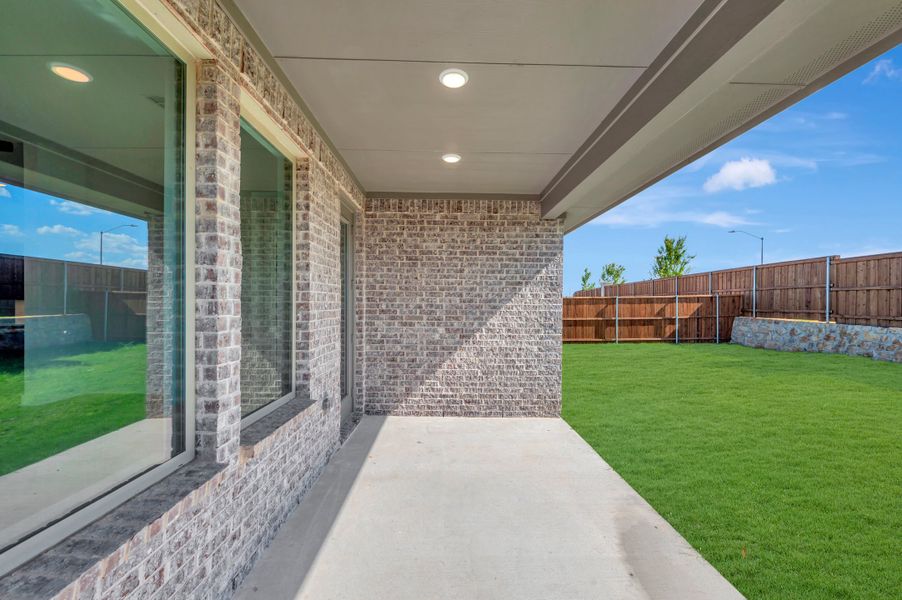 Exterior details and patio area of a home in LaPrelle, Haslet (Image 18).